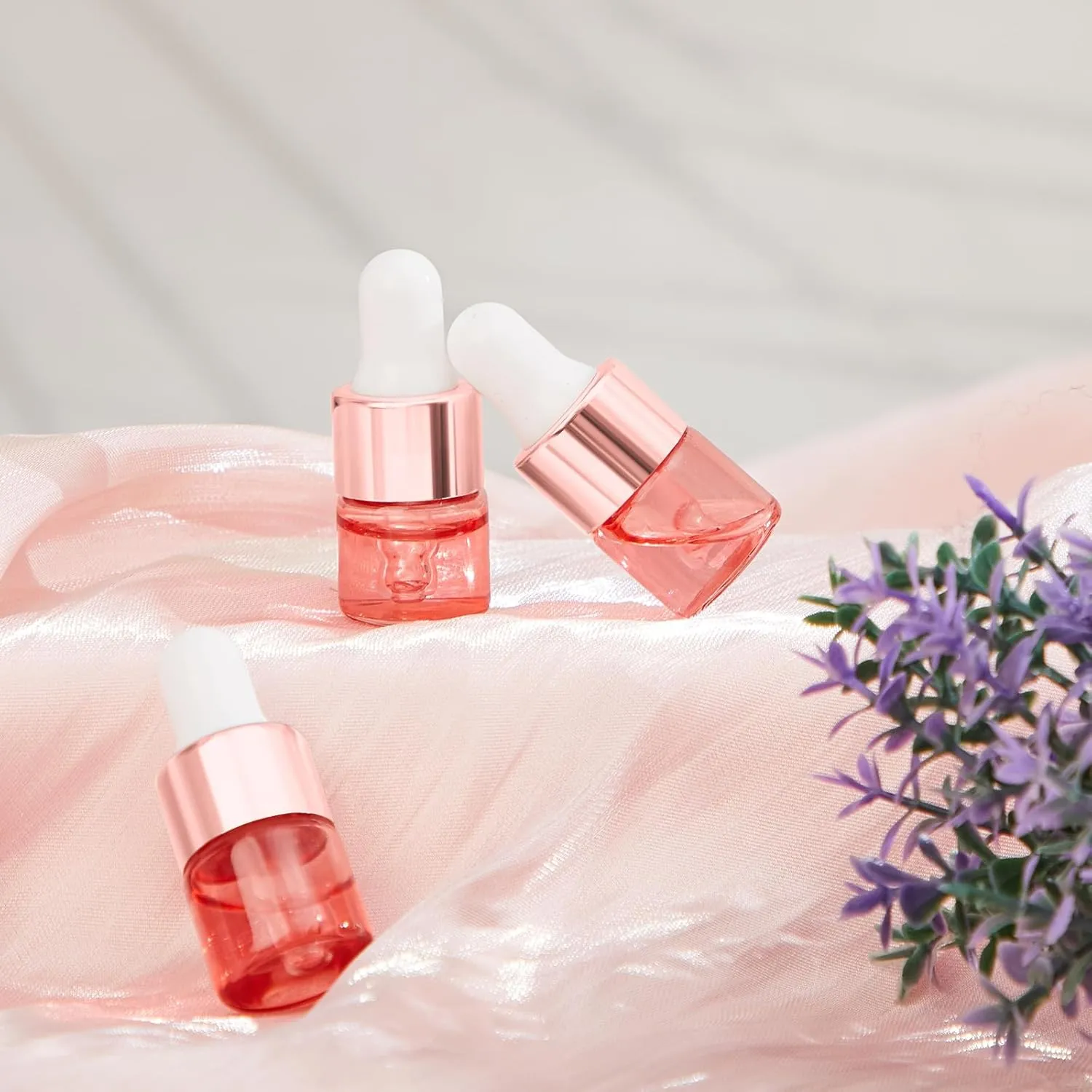 100 Pcs Mini Glass Oil Dropper Bottle Bulk, 1 ml Pink Rose Gold Essential Small Empty Bottles Sample Containers Perfume Liquid Vials with Cap for Traveling