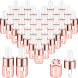 100 Pcs Mini Glass Oil Dropper Bottle Bulk, 2 ml Pink Rose Gold Essential Small Empty Bottles Sample Containers Perfume Liquid Vials with Cap for Traveling