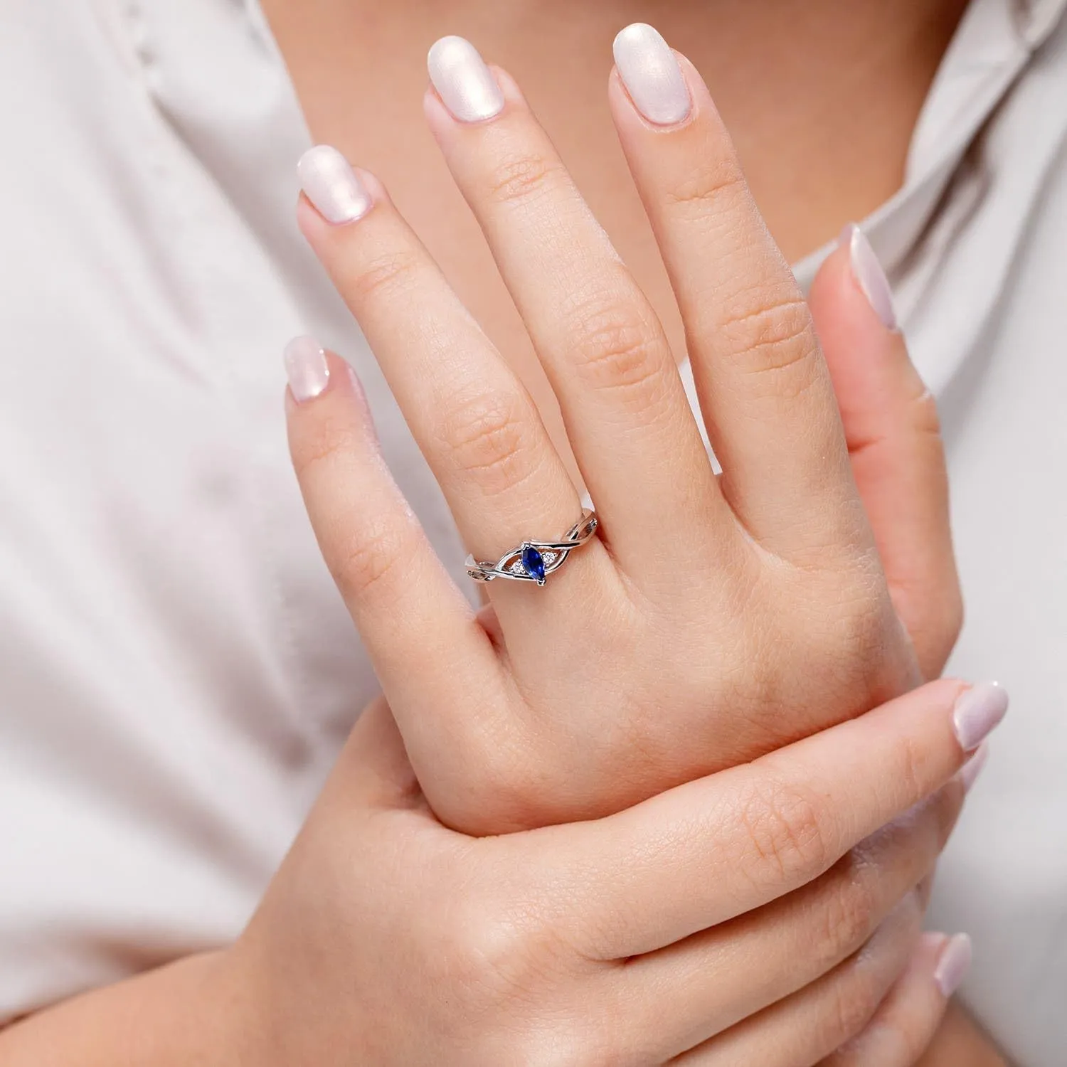Angara Natural Criss-Cross Marquise Blue Sapphire Solitaire Engagement Ring with Diamonds in 14K Solid Gold/Platinum | September Birthstone, Birthday, Anniversary, Wedding Jewelry Gift for Women