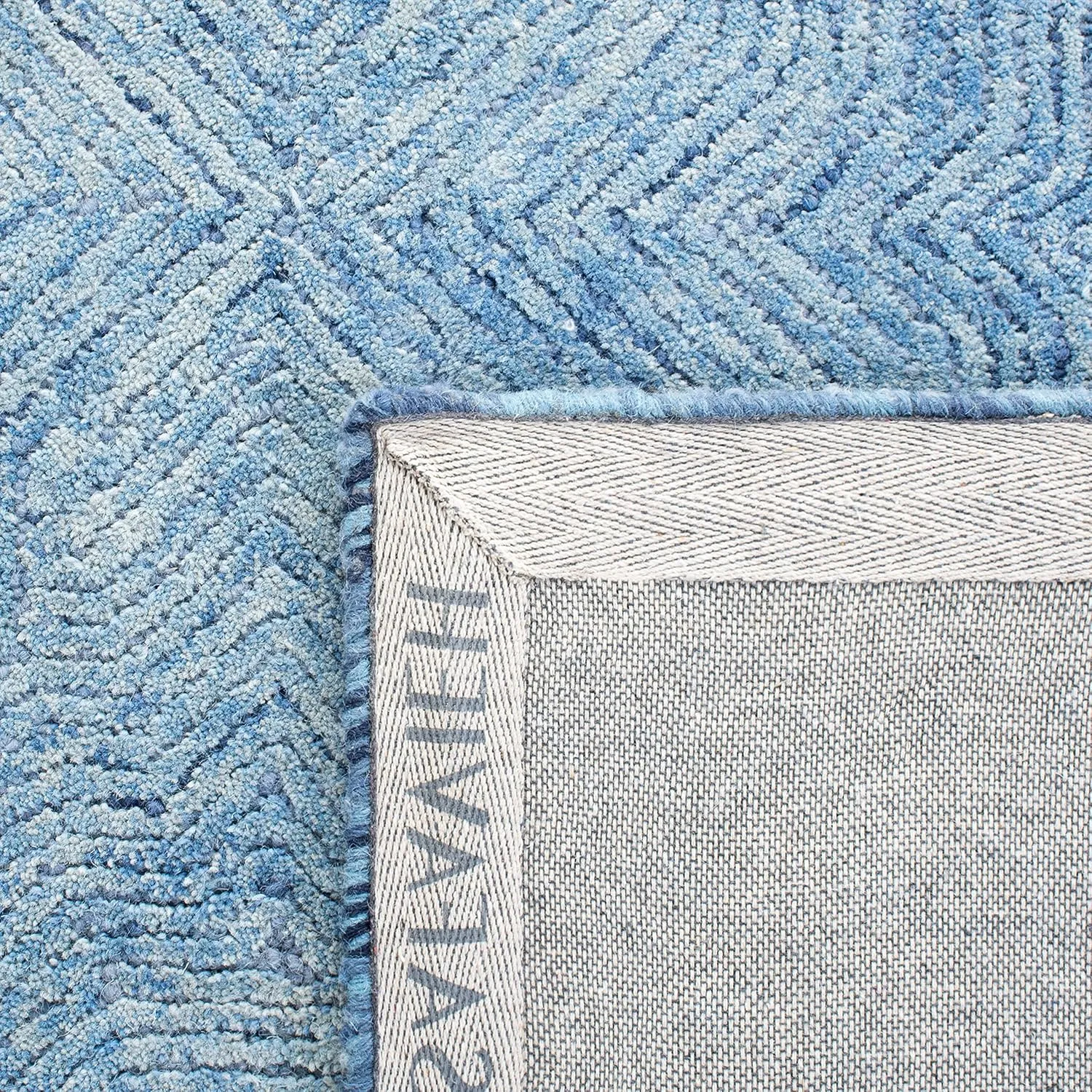 SAFAVIEH Ikat Collection Area Rug - 9' x 12', Blue, Handmade Wool, Ideal for High Traffic Areas in Living Room, Bedroom (IKT506M)