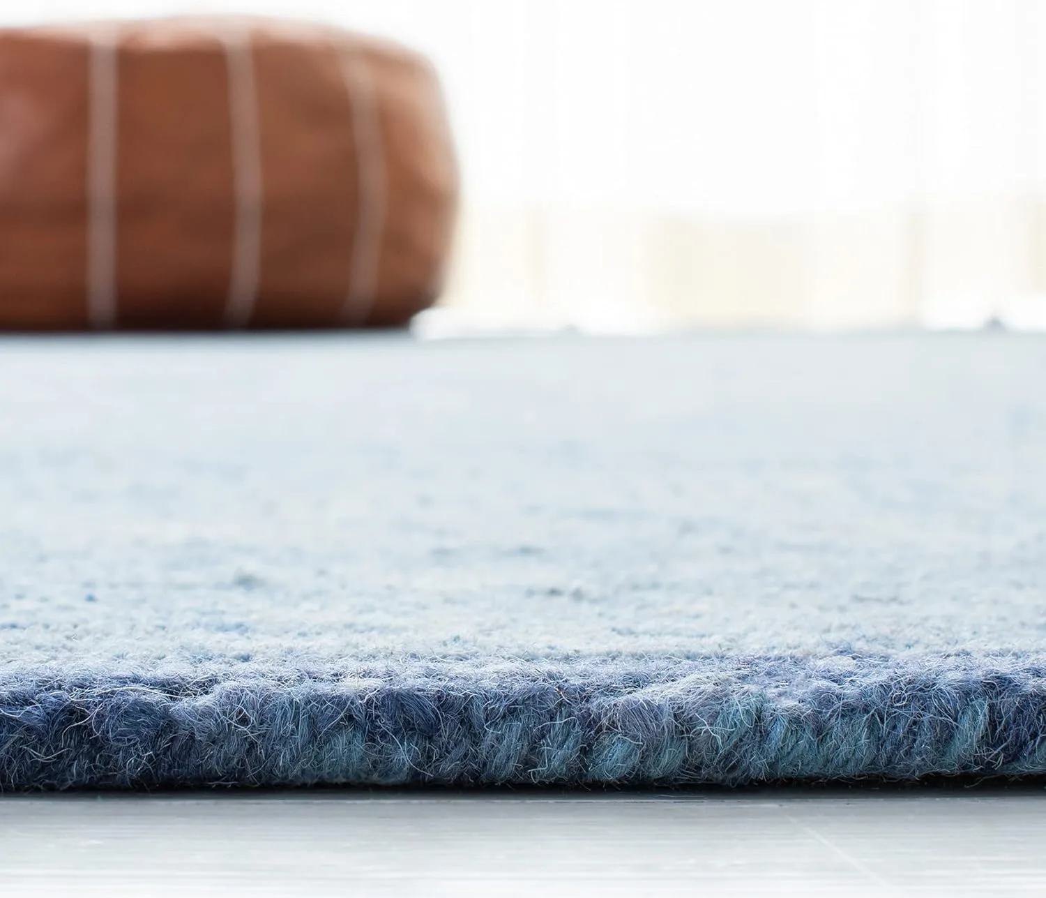 SAFAVIEH Ikat Collection Area Rug - 9' x 12', Blue, Handmade Wool, Ideal for High Traffic Areas in Living Room, Bedroom (IKT506M)