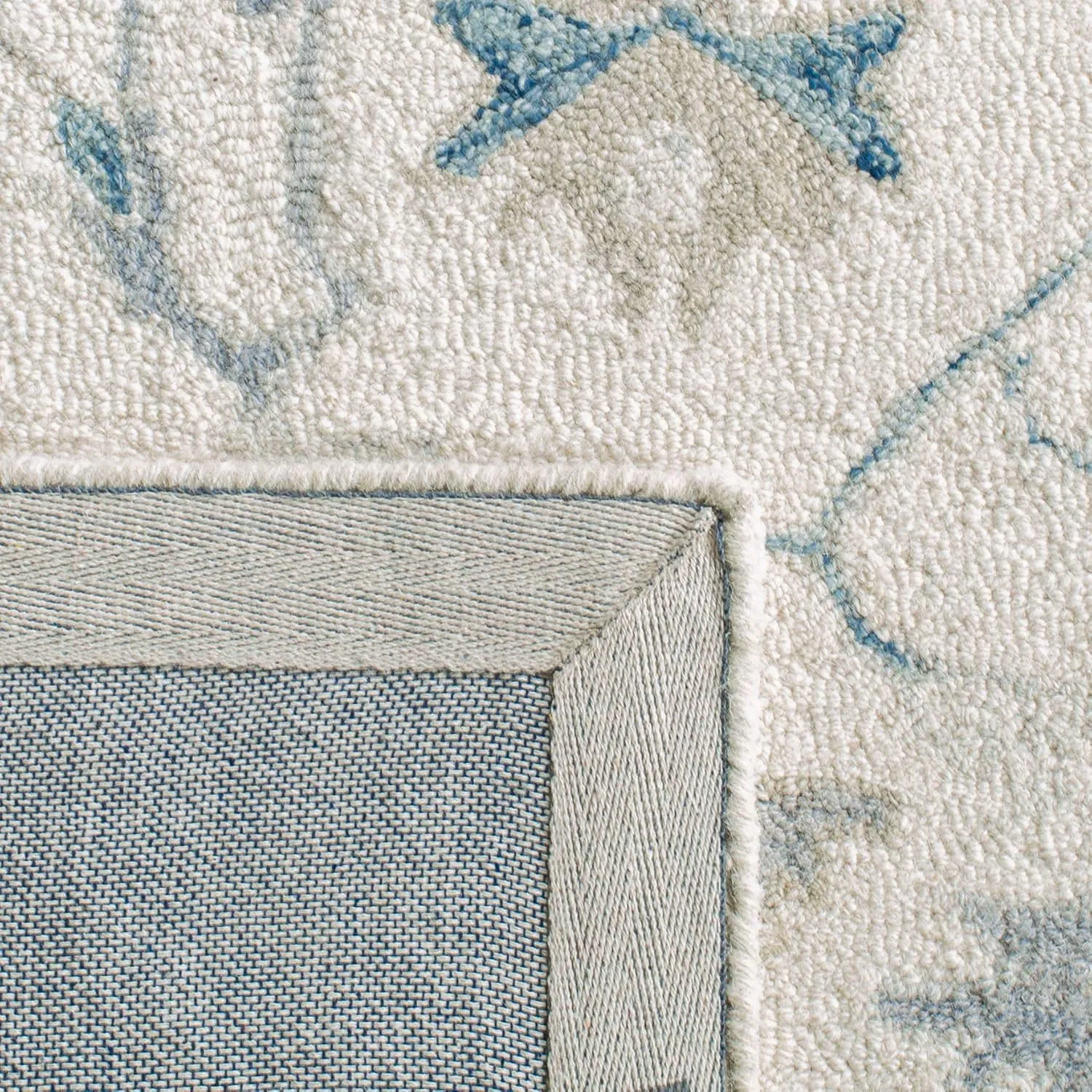 SAFAVIEH Micro-Loop Collection Runner Rug - 2'3" x 7', Ivory & Navy, Handmade Shabby Chic Medallion Wool, Ideal for High Traffic Areas in Living Room, Bedroom (MLP503L)