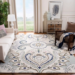 SAFAVIEH Bella Collection Area Rug - 9' x 12', Ivory & Blue, Handmade Boho Wool, Ideal for High Traffic Areas in Living Room, Bedroom (BEL118M)