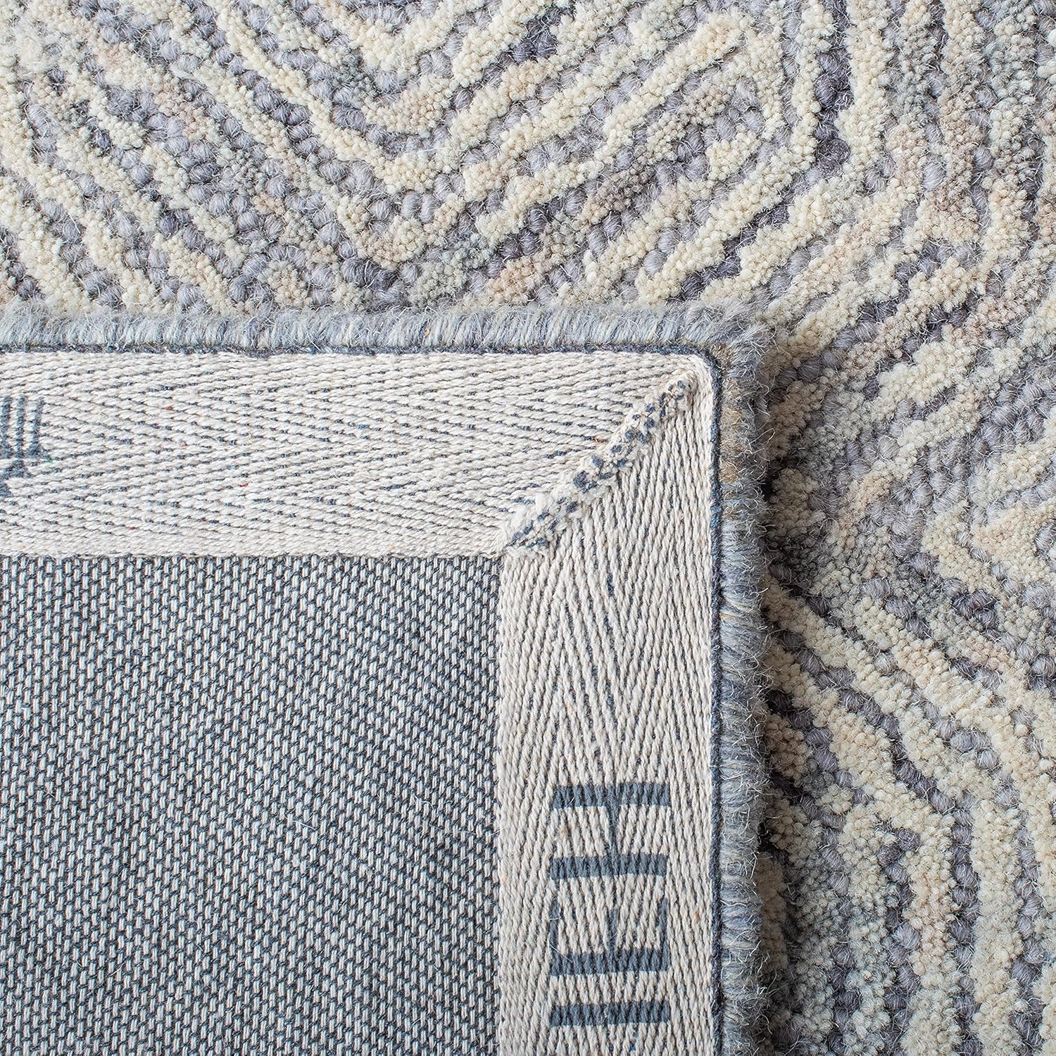 SAFAVIEH Ikat Collection Area Rug - 9' x 12', Silver, Handmade Wool, Ideal for High Traffic Areas in Living Room, Bedroom (IKT506G)